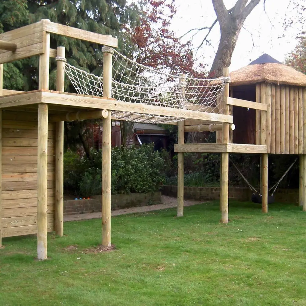 Small garden Treehouse Play-Set Garden Treehouse plus deck, Scramble Net Bridge and tower platform with Climbing Wall