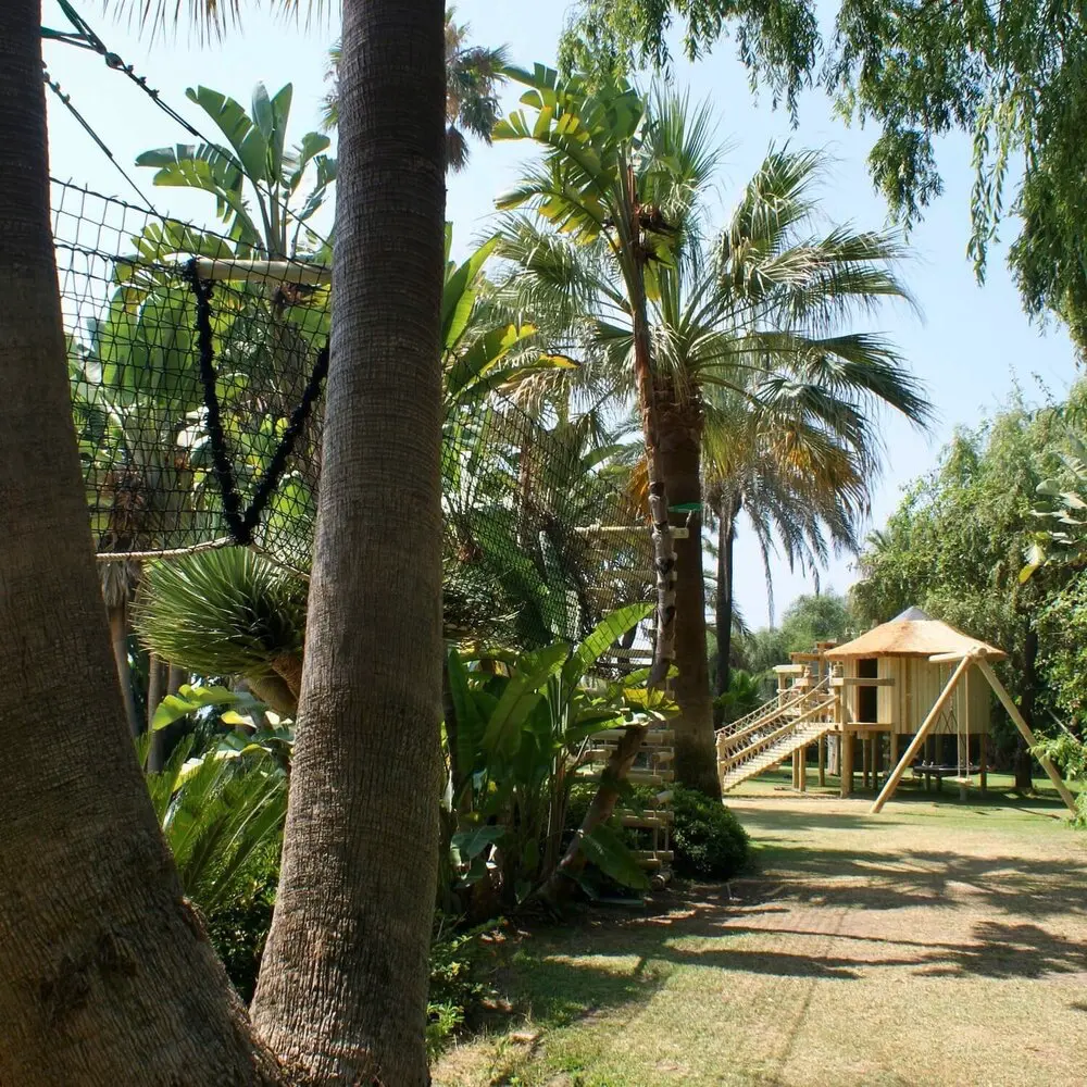 Adventure Garden Treehouse Côte d'Azur Family garden adventure Treehouse set into a French Riviera garden setting amongst palm trees.